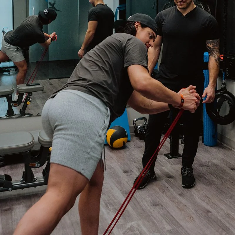 Movement screen evaluating rotational strength and core stability using resistance band